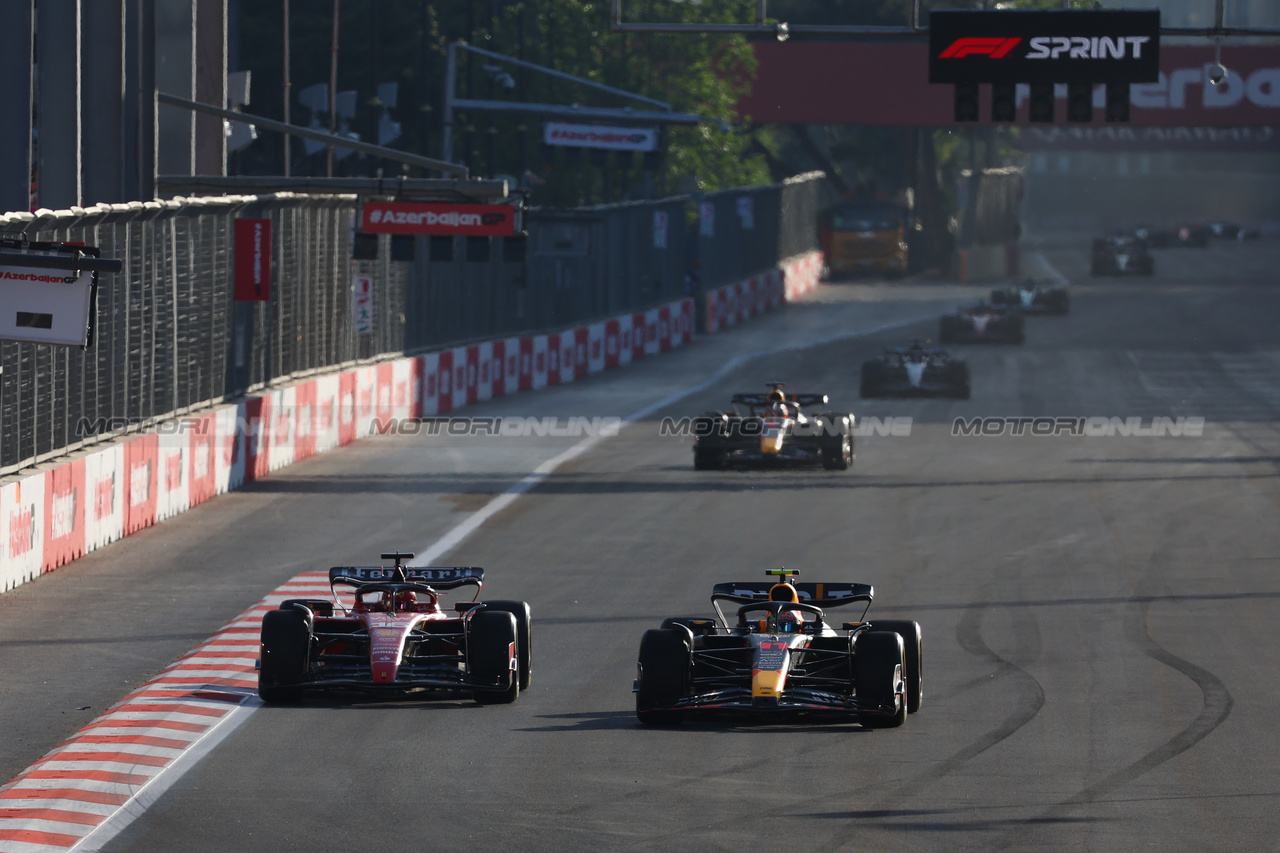 GP AZERBAIJAN, Charles Leclerc (MON) Ferrari SF-23 is passed by Sergio Perez (MEX) Red Bull Racing RB19 to lose the lead in the Sprint race.

29.04.2023. Formula 1 World Championship, Rd 4, Azerbaijan Grand Prix, Baku Street Circuit, Azerbaijan, Sprint Day.

- www.xpbimages.com, EMail: requests@xpbimages.com ¬© Copyright: Batchelor / XPB Images