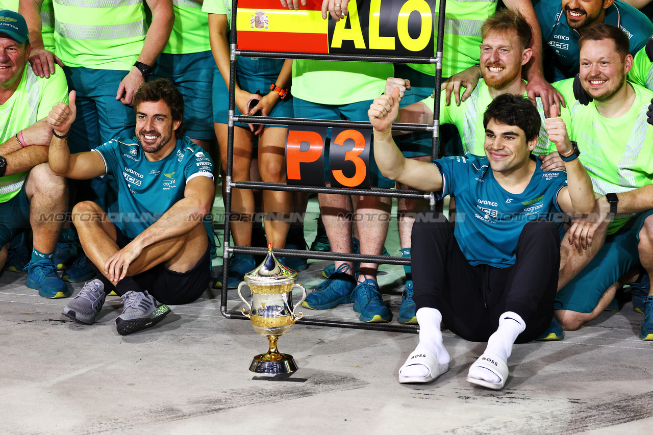 GP BAHRAIN, Lance Stroll (CDN) Aston Martin F1 Team (Right) celebrates third position for Fernando Alonso (ESP) Aston Martin F1 Team (Left).

05.03.2023. Formula 1 World Championship, Rd 1, Bahrain Grand Prix, Sakhir, Bahrain, Gara Day.

 - www.xpbimages.com, EMail: requests@xpbimages.com © Copyright: Coates / XPB Images