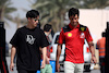 GP BAHRAIN, (L to R): Zhou Guanyu (CHN) Alfa Romeo F1 Team with Carlos Sainz Jr (ESP) Ferrari.
02.03.2023. Formula 1 World Championship, Rd 1, Bahrain Grand Prix, Sakhir, Bahrain, Preparation Day.
- www.xpbimages.com, EMail: requests@xpbimages.com © Copyright: Bearne / XPB Images