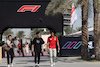 GP BAHRAIN, (L to R): Zhou Guanyu (CHN) Alfa Romeo F1 Team with Carlos Sainz Jr (ESP) Ferrari.
02.03.2023. Formula 1 World Championship, Rd 1, Bahrain Grand Prix, Sakhir, Bahrain, Preparation Day.
- www.xpbimages.com, EMail: requests@xpbimages.com © Copyright: Bearne / XPB Images