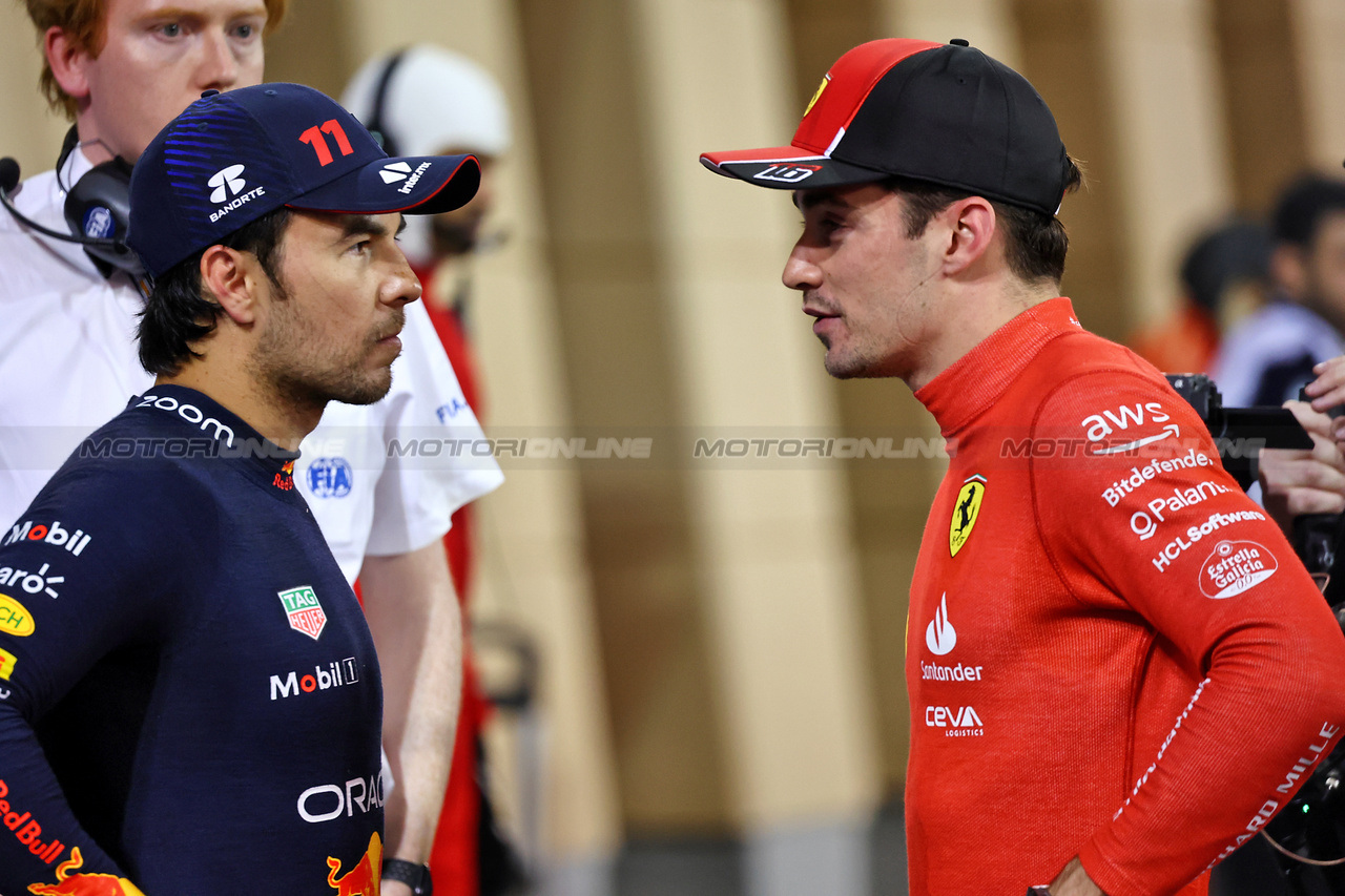 GP BAHRAIN, (L to R): Sergio Perez (MEX) Red Bull Racing in qualifying parc ferme with Charles Leclerc (MON) Ferrari.

04.03.2023. Formula 1 World Championship, Rd 1, Bahrain Grand Prix, Sakhir, Bahrain, Qualifiche Day.

- www.xpbimages.com, EMail: requests@xpbimages.com © Copyright: Batchelor / XPB Images