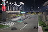 GP BAHRAIN, Zhou Guanyu (CHN) Alfa Romeo F1 Team C43 e Sergio Perez (MEX) Red Bull Racing RB19.
04.03.2023. Formula 1 World Championship, Rd 1, Bahrain Grand Prix, Sakhir, Bahrain, Qualifiche Day.
- www.xpbimages.com, EMail: requests@xpbimages.com © Copyright: Moy / XPB Images