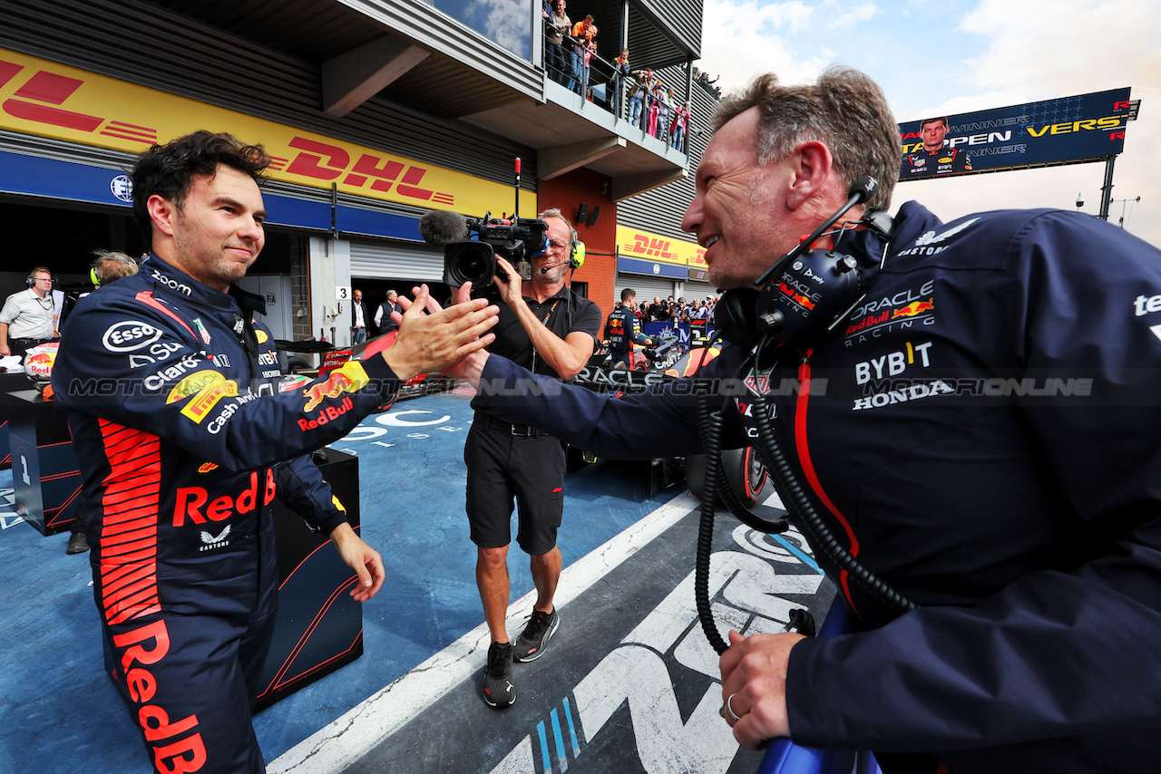 GP BELGIO, (L to R): Sergio Perez (MEX) Red Bull Racing celebrates his second position with Christian Horner (GBR) Red Bull Racing Team Principal in parc ferme.
30.07.2023. Formula 1 World Championship, Rd 13, Belgian Grand Prix, Spa Francorchamps, Belgium, Gara Day.
- www.xpbimages.com, EMail: requests@xpbimages.com © Copyright: Moy / XPB Images