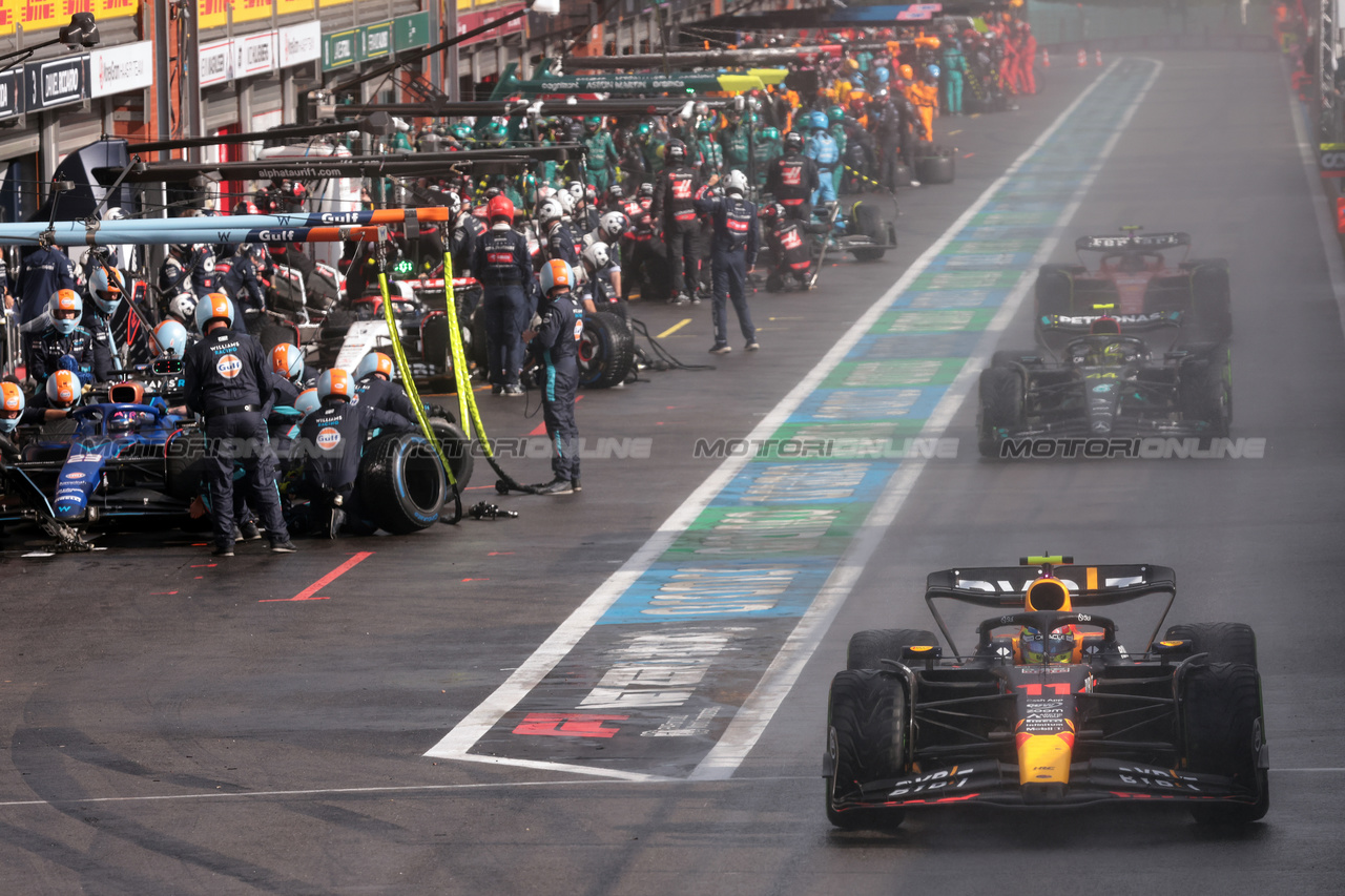 GP BELGIO, Sergio Perez (MEX) Red Bull Racing RB19 leaves the pits.

29.07.2023. Formula 1 World Championship, Rd 13, Belgian Grand Prix, Spa Francorchamps, Belgium, Sprint Day.

- www.xpbimages.com, EMail: requests@xpbimages.com © Copyright: Bearne / XPB Images
