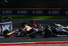 GP BELGIO, Sergio Perez (MEX) Red Bull Racing RB19 e Lewis Hamilton (GBR) Mercedes AMG F1 W14 battle for position.
29.07.2023. Formula 1 World Championship, Rd 13, Belgian Grand Prix, Spa Francorchamps, Belgium, Sprint Day.
 - www.xpbimages.com, EMail: requests@xpbimages.com © Copyright: Coates / XPB Images