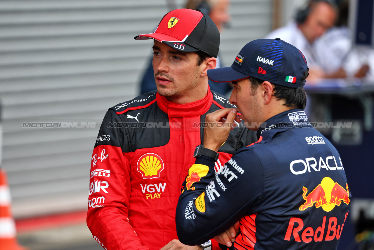 GP BELGIO, (L to R): Charles Leclerc (MON) Ferrari with Sergio Perez (MEX) Red Bull Racing in qualifying parc ferme.

28.07.2023. Formula 1 World Championship, Rd 13, Belgian Grand Prix, Spa Francorchamps, Belgium, Qualifiche Day.

- www.xpbimages.com, EMail: requests@xpbimages.com © Copyright: Batchelor / XPB Images