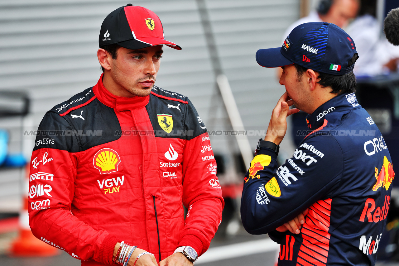 GP BELGIO, (L to R): Charles Leclerc (MON) Ferrari with Sergio Perez (MEX) Red Bull Racing in qualifying parc ferme.

28.07.2023. Formula 1 World Championship, Rd 13, Belgian Grand Prix, Spa Francorchamps, Belgium, Qualifiche Day.

- www.xpbimages.com, EMail: requests@xpbimages.com © Copyright: Batchelor / XPB Images
