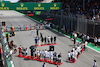 GP BRASILE, Drivers as the grid observes the national anthem.
05.11.2023. Formula 1 World Championship, Rd 21, Brazilian Grand Prix, Sao Paulo, Brazil, Gara Day.
- www.xpbimages.com, EMail: requests@xpbimages.com © Copyright: Batchelor / XPB Images