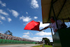 GP BRASILE, Circuit Atmosfera - marshal waves the red flag.
05.11.2023. Formula 1 World Championship, Rd 21, Brazilian Grand Prix, Sao Paulo, Brazil, Gara Day.
 - www.xpbimages.com, EMail: requests@xpbimages.com © Copyright: Coates / XPB Images