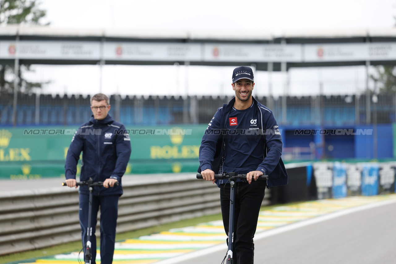 GP BRASILE, Daniel Ricciardo (AUS) AlphaTauri rides the circuit on a scooter.

02.11.2023. Formula 1 World Championship, Rd 21, Brazilian Grand Prix, Sao Paulo, Brazil, Preparation Day.

- www.xpbimages.com, EMail: requests@xpbimages.com © Copyright: Staley / XPB Images