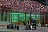 GP BRASILE, (L to R): Lewis Hamilton (GBR) Mercedes AMG F1 W14 e Yuki Tsunoda (JPN) AlphaTauri AT04 battle for position.
04.11.2023. Formula 1 World Championship, Rd 21, Brazilian Grand Prix, Sao Paulo, Brazil, Sprint Day.
 - www.xpbimages.com, EMail: requests@xpbimages.com © Copyright: Coates / XPB Images