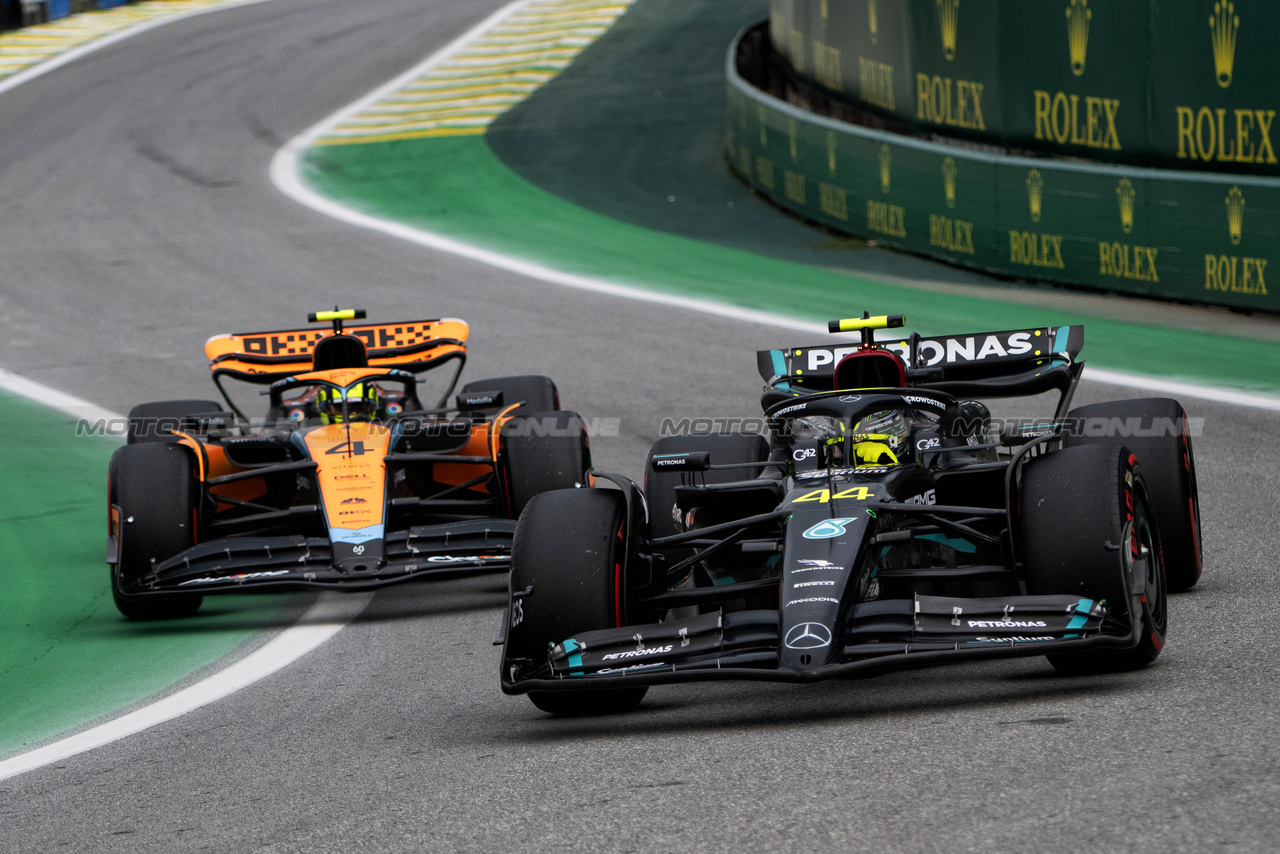 GP BRASILE, Lewis Hamilton (GBR) Mercedes AMG F1 W14 e Lando Norris (GBR) McLaren MCL60 leave the pits.

03.11.2023. Formula 1 World Championship, Rd 21, Brazilian Grand Prix, Sao Paulo, Brazil, Qualifiche Day.

- www.xpbimages.com, EMail: requests@xpbimages.com © Copyright: Price / XPB Images