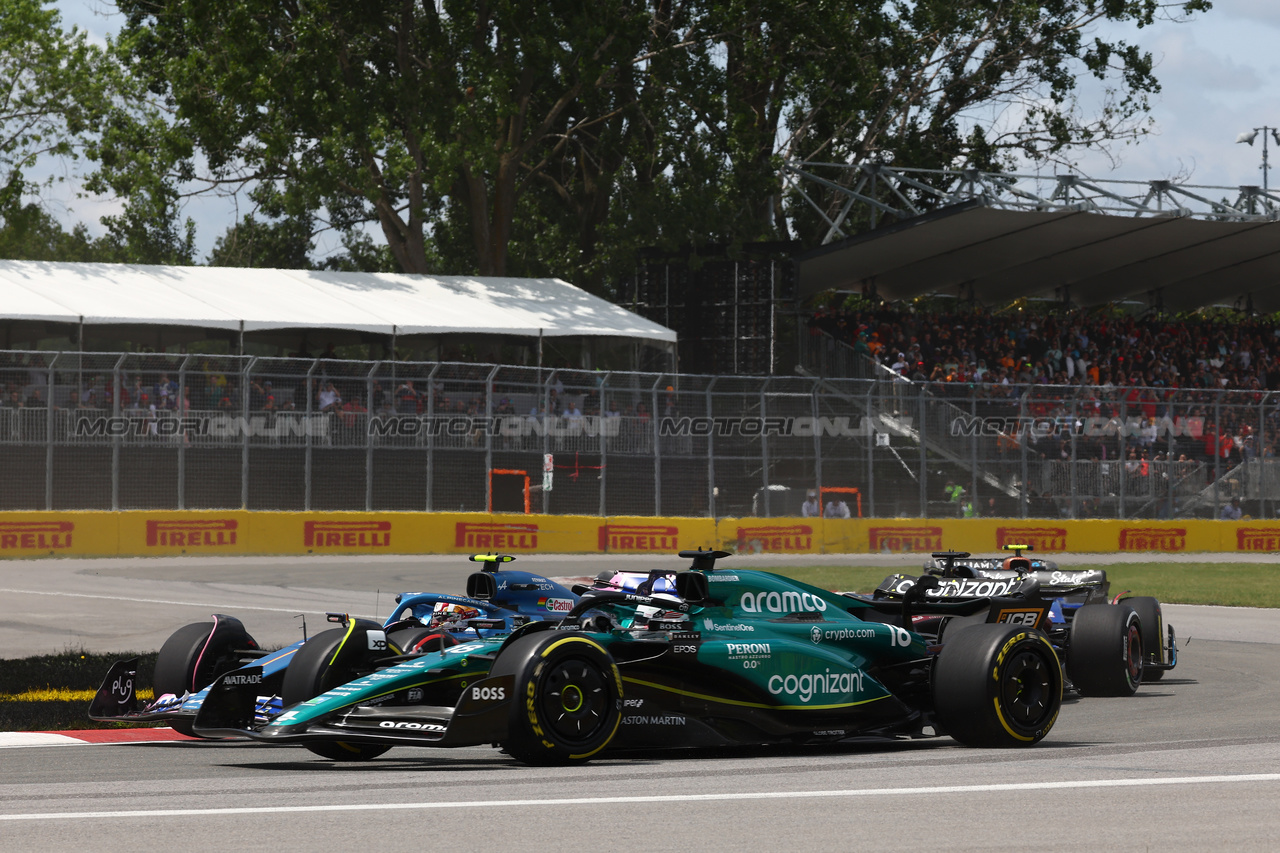 GP CANADA, Lance Stroll (CDN) Aston Martin F1 Team AMR23 e Pierre Gasly (FRA) Alpine F1 Team A523 battle for position.

18.06.2023. Formula 1 World Championship, Rd 9, Canadian Grand Prix, Montreal, Canada, Gara Day.

- www.xpbimages.com, EMail: requests@xpbimages.com © Copyright: Batchelor / XPB Images