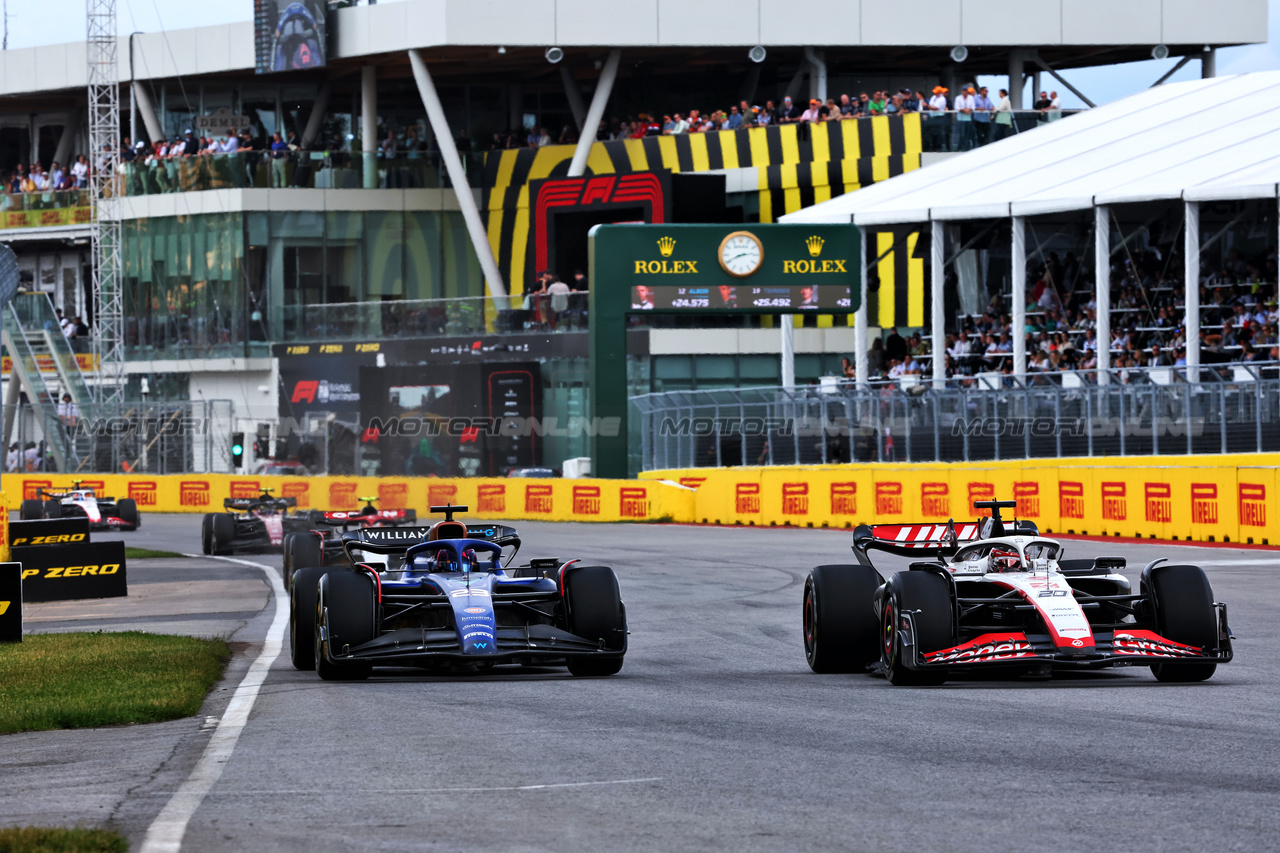 GP CANADA, Alexander Albon (THA) Williams Racing FW45 e Kevin Magnussen (DEN) Haas VF-23 battle for position.

18.06.2023. Formula 1 World Championship, Rd 9, Canadian Grand Prix, Montreal, Canada, Gara Day.

- www.xpbimages.com, EMail: requests@xpbimages.com © Copyright: Charniaux / XPB Images
