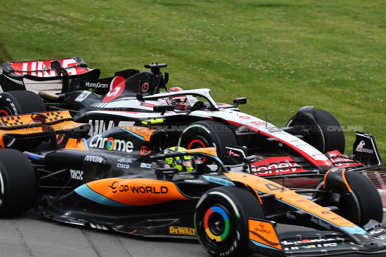 GP CANADA, Lando Norris (GBR) McLaren MCL60 e Kevin Magnussen (DEN) Haas VF-23 battle for position.

18.06.2023. Formula 1 World Championship, Rd 9, Canadian Grand Prix, Montreal, Canada, Gara Day.

- www.xpbimages.com, EMail: requests@xpbimages.com © Copyright: Charniaux / XPB Images