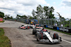 GP CANADA, Nyck de Vries (NLD) AlphaTauri AT04 e Kevin Magnussen (DEN) Haas VF-23 run on at the exit road e reverse back on to the circuit.
18.06.2023. Formula 1 World Championship, Rd 9, Canadian Grand Prix, Montreal, Canada, Gara Day.
 - www.xpbimages.com, EMail: requests@xpbimages.com © Copyright: Coates / XPB Images