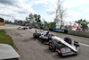 GP CANADA, Nyck de Vries (NLD) AlphaTauri AT04 e Kevin Magnussen (DEN) Haas VF-23 run on at the exit road e reverse back on to the circuit.
18.06.2023. Formula 1 World Championship, Rd 9, Canadian Grand Prix, Montreal, Canada, Gara Day.
 - www.xpbimages.com, EMail: requests@xpbimages.com © Copyright: Coates / XPB Images