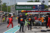 GP CANADA, George Russell (GBR) Mercedes AMG F1 W14 makes a pit stop to fix damage as a Ferrari mechanic collects an errant wheel carcass.
18.06.2023. Formula 1 World Championship, Rd 9, Canadian Grand Prix, Montreal, Canada, Gara Day.
- www.xpbimages.com, EMail: requests@xpbimages.com © Copyright: Batchelor / XPB Images