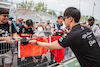 GP CANADA, Zhou Guanyu (CHN) Alfa Romeo F1 Team with fans in the pits.
15.06.2023. Formula 1 World Championship, Rd 9, Canadian Grand Prix, Montreal, Canada, Preparation Day.
- www.xpbimages.com, EMail: requests@xpbimages.com © Copyright: Bearne / XPB Images