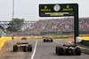 GP CANADA, Sergio Perez (MEX) Red Bull Racing RB19 e Lando Norris (GBR) McLaren MCL60 leave the pits.
16.06.2023. Formula 1 World Championship, Rd 9, Canadian Grand Prix, Montreal, Canada, Practice Day.
- www.xpbimages.com, EMail: requests@xpbimages.com © Copyright: Batchelor / XPB Images