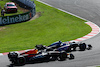 GP GIAPPONE, (L to R): Sergio Perez (MEX) Red Bull Racing RB19 e Esteban Ocon (FRA) Alpine F1 Team A523 battle for position.
24.09.2023. Formula 1 World Championship, Rd 17, Japanese Grand Prix, Suzuka, Japan, Gara Day.
 - www.xpbimages.com, EMail: requests@xpbimages.com © Copyright: Coates / XPB Images
