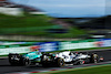 GP GIAPPONE, Yuki Tsunoda (JPN) AlphaTauri AT04 e Fernando Alonso (ESP) Aston Martin F1 Team AMR23 battle for position.
24.09.2023. Formula 1 World Championship, Rd 17, Japanese Grand Prix, Suzuka, Japan, Gara Day.
 - www.xpbimages.com, EMail: requests@xpbimages.com © Copyright: Coates / XPB Images