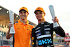 GP GIAPPONE, (L to R): Oscar Piastri (AUS) McLaren celebrates his third position second placed team mate Lando Norris (GBR) McLaren.
24.09.2023. Formula 1 World Championship, Rd 17, Japanese Grand Prix, Suzuka, Japan, Gara Day.
- www.xpbimages.com, EMail: requests@xpbimages.com © Copyright: Batchelor / XPB Images