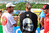 GP GIAPPONE, (L to R): Sebastian Vettel (GER) with Lewis Hamilton (GBR) Mercedes AMG F1 e Charles Leclerc (MON) Ferrari - Bee Hotel at Buzzin' Corner. 
21.09.2023. Formula 1 World Championship, Rd 17, Japanese Grand Prix, Suzuka, Japan, Preparation Day.
- www.xpbimages.com, EMail: requests@xpbimages.com © Copyright: Batchelor / XPB Images