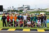 GP GIAPPONE, A drivers' group photograph with Sebastian Vettel (GER) - Bee Hotel at Buzzin' Corner. 
21.09.2023. Formula 1 World Championship, Rd 17, Japanese Grand Prix, Suzuka, Japan, Preparation Day.
- www.xpbimages.com, EMail: requests@xpbimages.com © Copyright: Batchelor / XPB Images