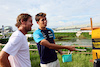 GP GIAPPONE, (L to R): Sebastian Vettel (GER) e Alexander Albon (THA) Williams Racing - Bee Hotel at Buzzin' Corner. 
21.09.2023. Formula 1 World Championship, Rd 17, Japanese Grand Prix, Suzuka, Japan, Preparation Day.
- www.xpbimages.com, EMail: requests@xpbimages.com © Copyright: Batchelor / XPB Images
