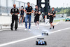 GP GIAPPONE, Esteban Ocon (FRA), Alpine F1 Team e Lewis Hamilton (GBR), Mercedes AMG F1  race with RC cars
21.09.2023. Formula 1 World Championship, Rd 17, Japanese Grand Prix, Suzuka, Japan, Preparation Day.
- www.xpbimages.com, EMail: requests@xpbimages.com © Copyright: Charniaux / XPB Images