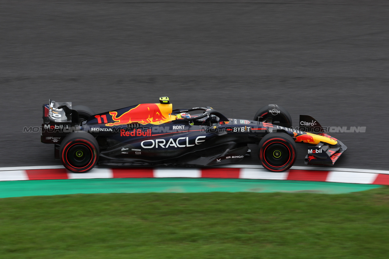GP GIAPPONE, Sergio Perez (MEX) Red Bull Racing RB19.

22.09.2023. Formula 1 World Championship, Rd 17, Japanese Grand Prix, Suzuka, Japan, Practice Day.

- www.xpbimages.com, EMail: requests@xpbimages.com © Copyright: Moy / XPB Images