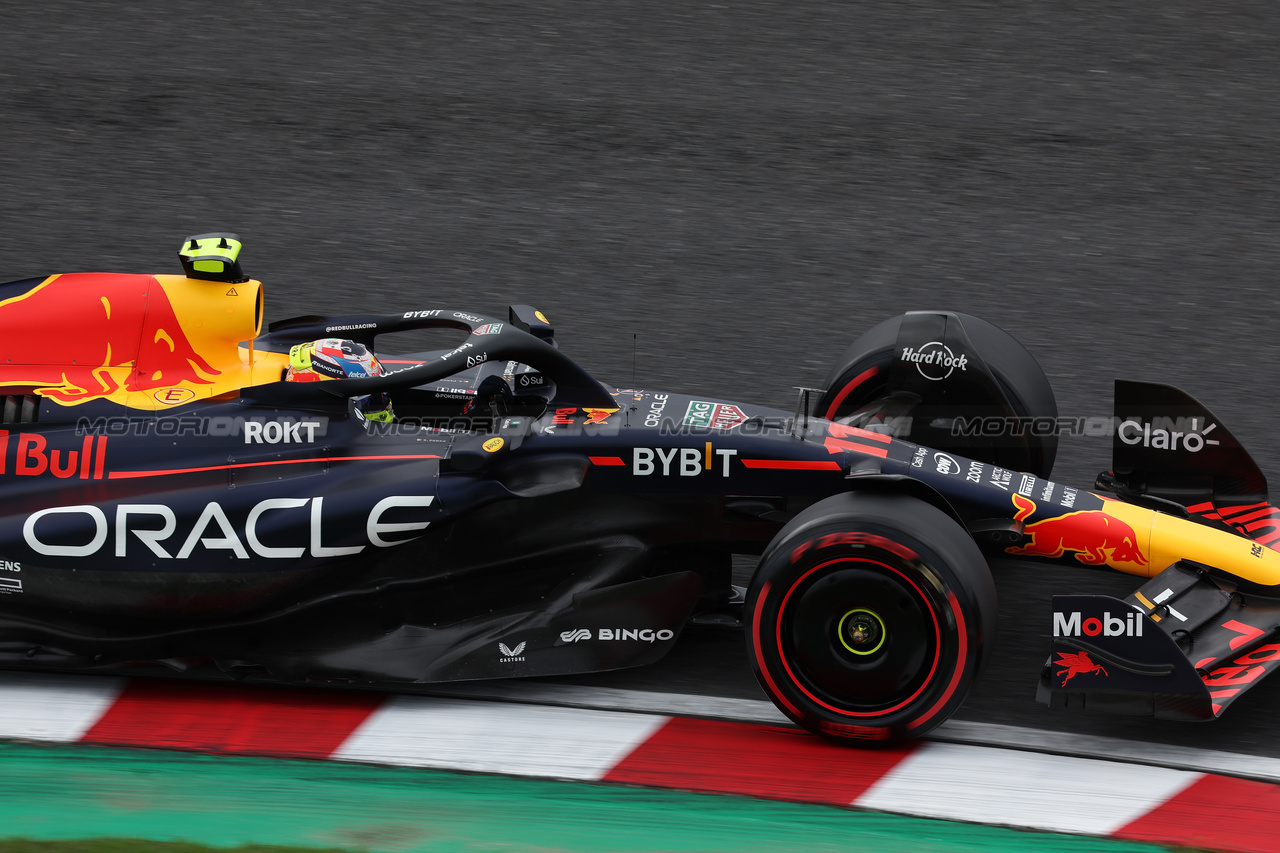 GP GIAPPONE, Sergio Perez (MEX) Red Bull Racing RB19.

22.09.2023. Formula 1 World Championship, Rd 17, Japanese Grand Prix, Suzuka, Japan, Practice Day.

- www.xpbimages.com, EMail: requests@xpbimages.com © Copyright: Moy / XPB Images