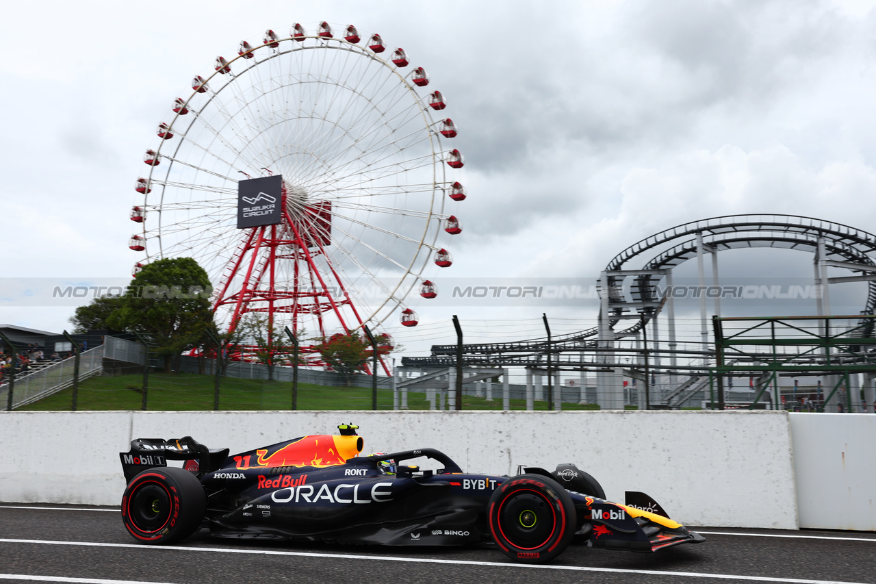 GP GIAPPONE, Sergio Perez (MEX) Red Bull Racing RB19.

22.09.2023. Formula 1 World Championship, Rd 17, Japanese Grand Prix, Suzuka, Japan, Practice Day.

- www.xpbimages.com, EMail: requests@xpbimages.com © Copyright: Batchelor / XPB Images