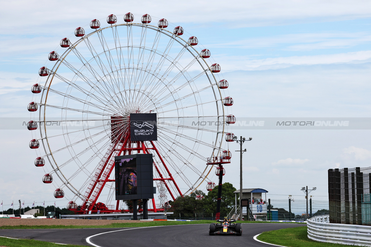 GP GIAPPONE, Sergio Perez (MEX) Red Bull Racing RB19.

22.09.2023. Formula 1 World Championship, Rd 17, Japanese Grand Prix, Suzuka, Japan, Practice Day.

- www.xpbimages.com, EMail: requests@xpbimages.com © Copyright: Moy / XPB Images