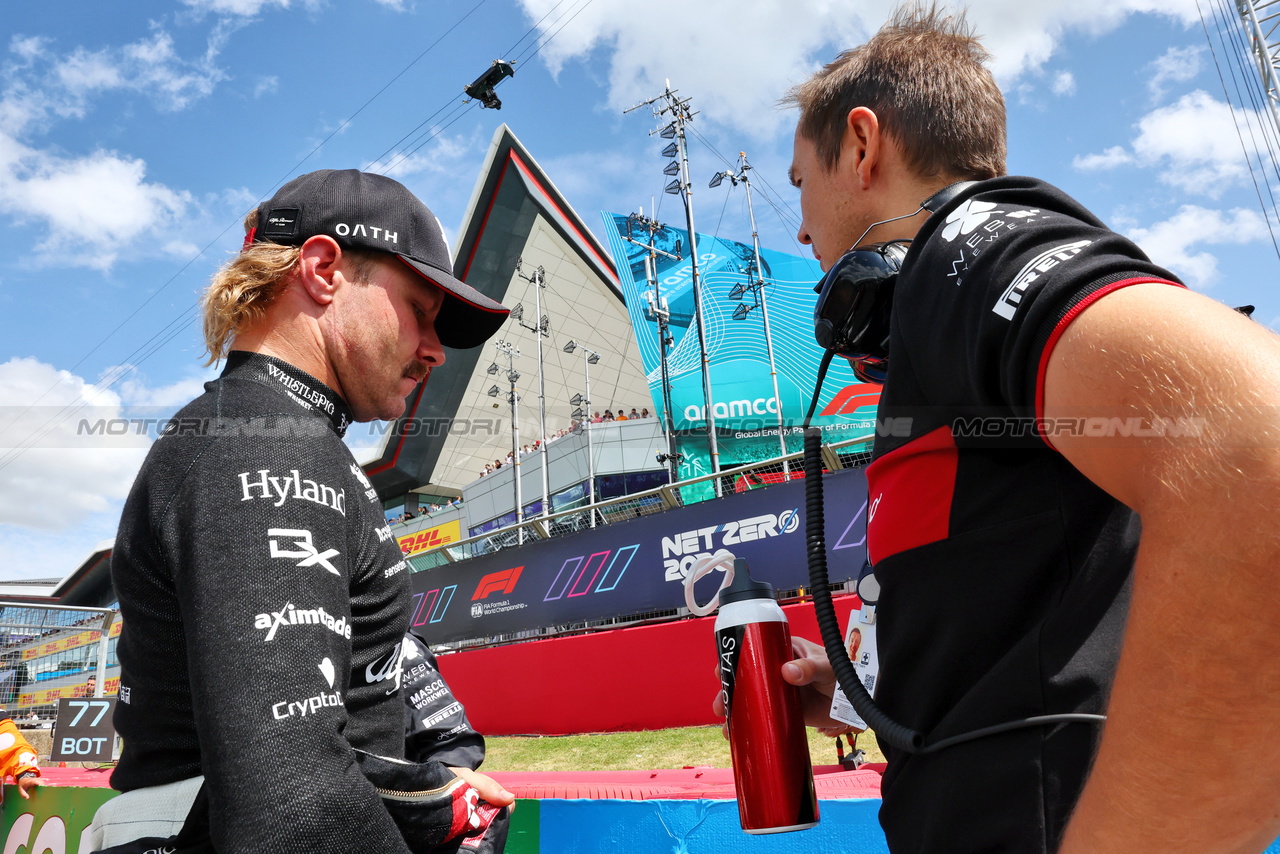 GP GRAN BRETAGNA, Valtteri Bottas (FIN) Alfa Romeo F1 Team on the grid.

09.07.2023. Formula 1 World Championship, Rd 11, British Grand Prix, Silverstone, England, Gara Day.

- www.xpbimages.com, EMail: requests@xpbimages.com © Copyright: Batchelor / XPB Images