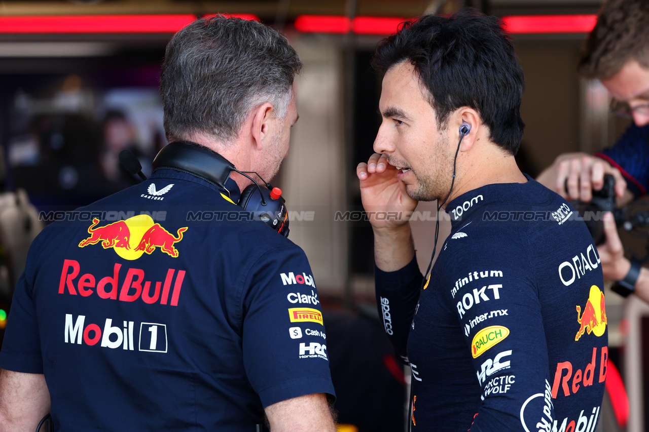 GP GRAN BRETAGNA, (L to R): Christian Horner (GBR) Red Bull Racing Team Principal with Sergio Perez (MEX) Red Bull Racing.

07.07.2023. Formula 1 World Championship, Rd 11, British Grand Prix, Silverstone, England, Practice Day.

- www.xpbimages.com, EMail: requests@xpbimages.com © Copyright: Batchelor / XPB Images