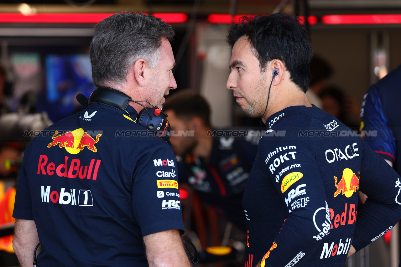 GP GRAN BRETAGNA, (L to R): Christian Horner (GBR) Red Bull Racing Team Principal with Sergio Perez (MEX) Red Bull Racing.

07.07.2023. Formula 1 World Championship, Rd 11, British Grand Prix, Silverstone, England, Practice Day.

- www.xpbimages.com, EMail: requests@xpbimages.com © Copyright: Batchelor / XPB Images