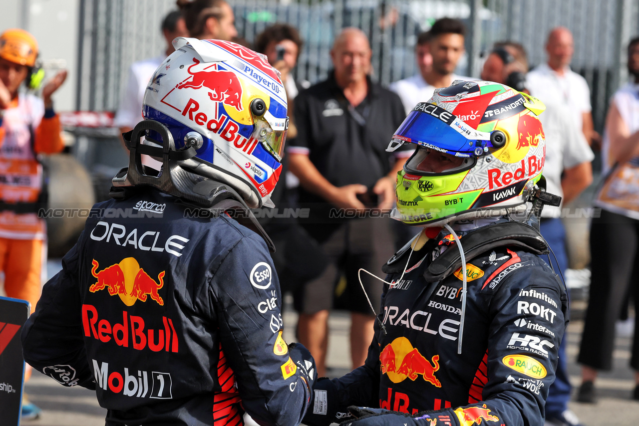 GP ITALIA, (L to R): Gara winner Max Verstappen (NLD) Red Bull Racing celebrates in parc ferme with team mate Sergio Perez (MEX) Red Bull Racing.

03.09.2023. Formula 1 World Championship, Rd 15, Italian Grand Prix, Monza, Italy, Gara Day.

- www.xpbimages.com, EMail: requests@xpbimages.com © Copyright: Bearne / XPB Images