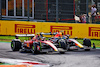 GP ITALIA, Carlos Sainz Jr (ESP) Ferrari SF-23 e Sergio Perez (MEX) Red Bull Racing RB19 battle for position.
03.09.2023. Formula 1 World Championship, Rd 15, Italian Grand Prix, Monza, Italy, Gara Day.
- www.xpbimages.com, EMail: requests@xpbimages.com © Copyright: Batchelor / XPB Images