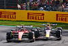 GP ITALIA, Carlos Sainz Jr (ESP) Ferrari SF-23 e Sergio Perez (MEX) Red Bull Racing RB19 battle for position.
03.09.2023. Formula 1 World Championship, Rd 15, Italian Grand Prix, Monza, Italy, Gara Day.
- www.xpbimages.com, EMail: requests@xpbimages.com © Copyright: Batchelor / XPB Images