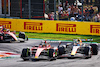 GP ITALIA, Carlos Sainz Jr (ESP) Ferrari SF-23 e Sergio Perez (MEX) Red Bull Racing RB19 battle for position.
03.09.2023. Formula 1 World Championship, Rd 15, Italian Grand Prix, Monza, Italy, Gara Day.
- www.xpbimages.com, EMail: requests@xpbimages.com © Copyright: Batchelor / XPB Images