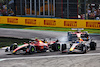 GP ITALIA, Carlos Sainz Jr (ESP) Ferrari SF-23 e Sergio Perez (MEX) Red Bull Racing RB19 battle for position.
03.09.2023. Formula 1 World Championship, Rd 15, Italian Grand Prix, Monza, Italy, Gara Day.
- www.xpbimages.com, EMail: requests@xpbimages.com © Copyright: Batchelor / XPB Images