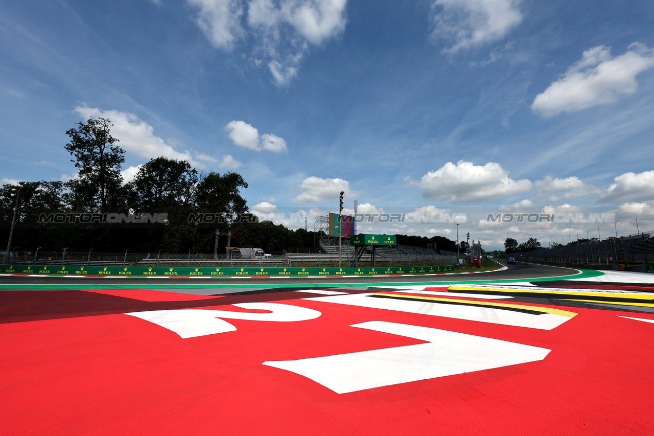 GP ITALIA, Circuit Atmosfera - #27 painted on the run off at the final corner.

31.08.2023. Formula 1 World Championship, Rd 15, Italian Grand Prix, Monza, Italy, Preparation Day.

- www.xpbimages.com, EMail: requests@xpbimages.com © Copyright: Moy / XPB Images