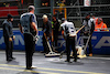 GP LAS VEGAS, Circuit workers fill manhole covers on the circuit.
16.11.2023. Formula 1 World Championship, Rd 22, Las Vegas Grand Prix, Las Vegas, Nevada, USA, Practice Day.
 - www.xpbimages.com, EMail: requests@xpbimages.com © Copyright: Coates / XPB Images