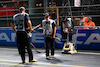 GP LAS VEGAS, Circuit workers fill manhole covers on the circuit.
16.11.2023. Formula 1 World Championship, Rd 22, Las Vegas Grand Prix, Las Vegas, Nevada, USA, Practice Day.
 - www.xpbimages.com, EMail: requests@xpbimages.com © Copyright: Coates / XPB Images