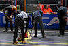 GP LAS VEGAS, Circuit workers fill manhole covers on the circuit.
16.11.2023. Formula 1 World Championship, Rd 22, Las Vegas Grand Prix, Las Vegas, Nevada, USA, Practice Day.
 - www.xpbimages.com, EMail: requests@xpbimages.com © Copyright: Coates / XPB Images