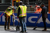 GP LAS VEGAS, Circuit workers fill manhole covers on the circuit.
16.11.2023. Formula 1 World Championship, Rd 22, Las Vegas Grand Prix, Las Vegas, Nevada, USA, Practice Day.
 - www.xpbimages.com, EMail: requests@xpbimages.com © Copyright: Coates / XPB Images