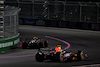 GP LAS VEGAS, Oscar Piastri (AUS) McLaren MCL60 e Sergio Perez (MEX) Red Bull Racing RB19.
16.11.2023. Formula 1 World Championship, Rd 22, Las Vegas Grand Prix, Las Vegas, Nevada, USA, Practice Day.
- www.xpbimages.com, EMail: requests@xpbimages.com © Copyright: Moy / XPB Images