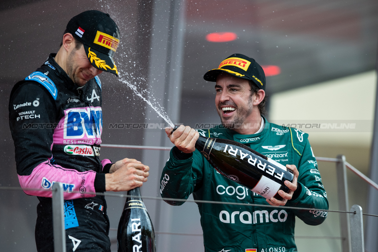 GP MONACO, Fernando Alonso (ESP) Aston Martin F1 Team celebrates his second position with third placed Esteban Ocon (FRA) Alpine F1 Team on the podium.

28.05.2023. Formula 1 World Championship, Rd 7, Monaco Grand Prix, Monte Carlo, Monaco, Gara Day.

- www.xpbimages.com, EMail: requests@xpbimages.com ¬© Copyright: Price / XPB Images